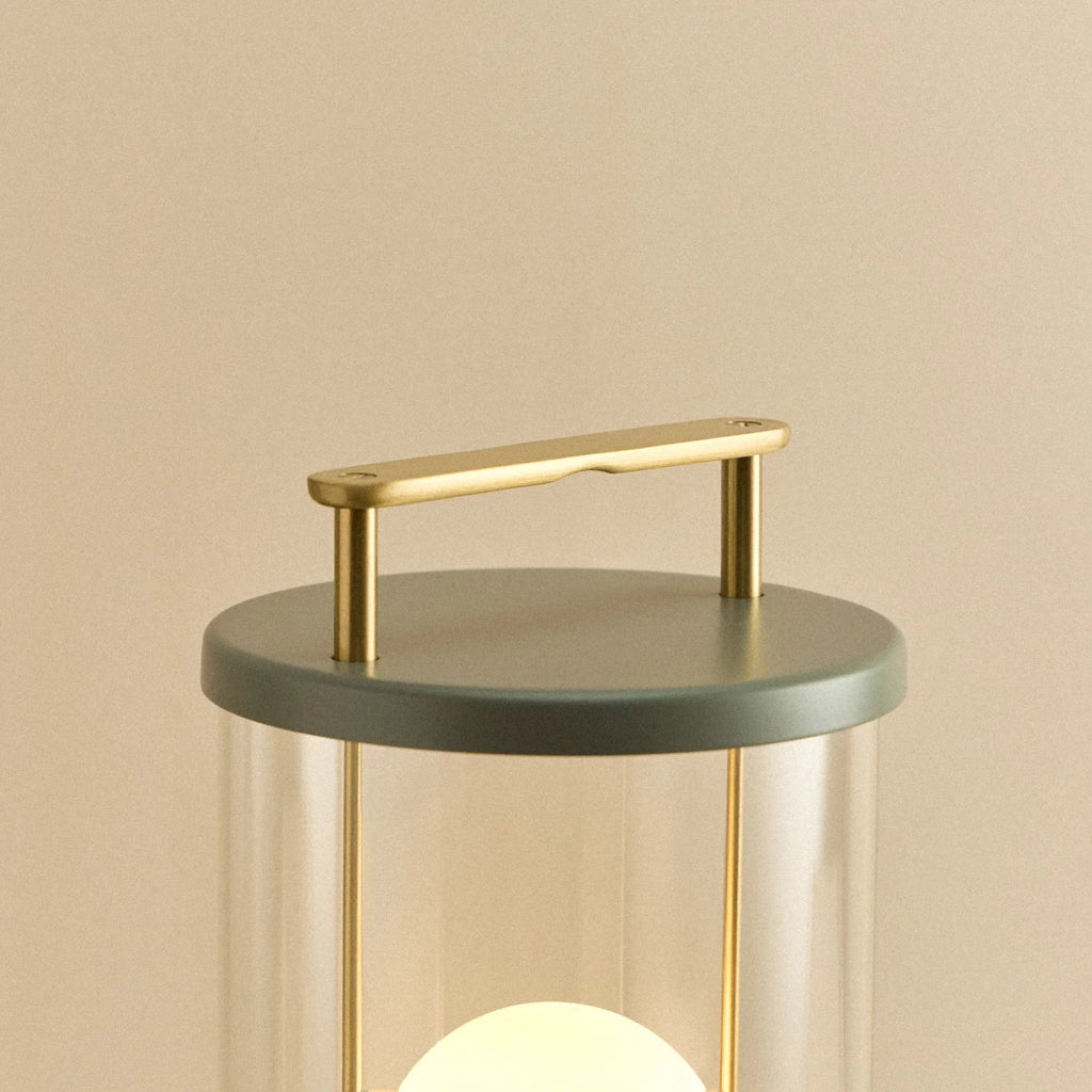 Cordless lantern lamp, green finish, close-up of the handle and top