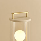Cordless lantern lamp, plaster pink finish, close-up of the handle and top