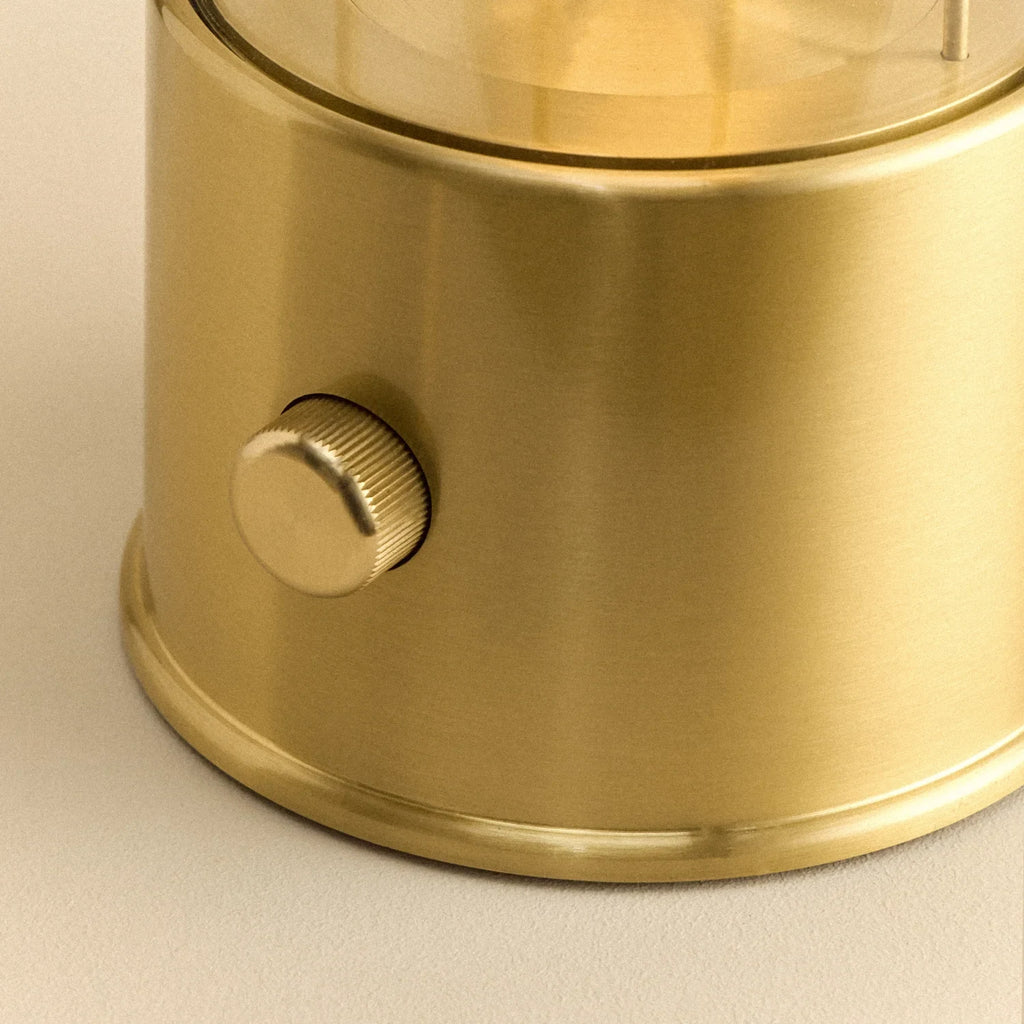Cordless lantern lamp, solid brass, close-up of the control knob