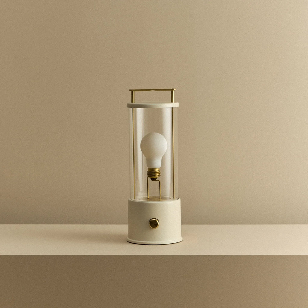 Cordless lantern lamp, white finish, unlit, on a plain ledge