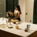 Cordless lantern lamp, yellow finish, on a kitchen island