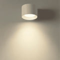 Cordless rechargeable wall light, in white, lit
