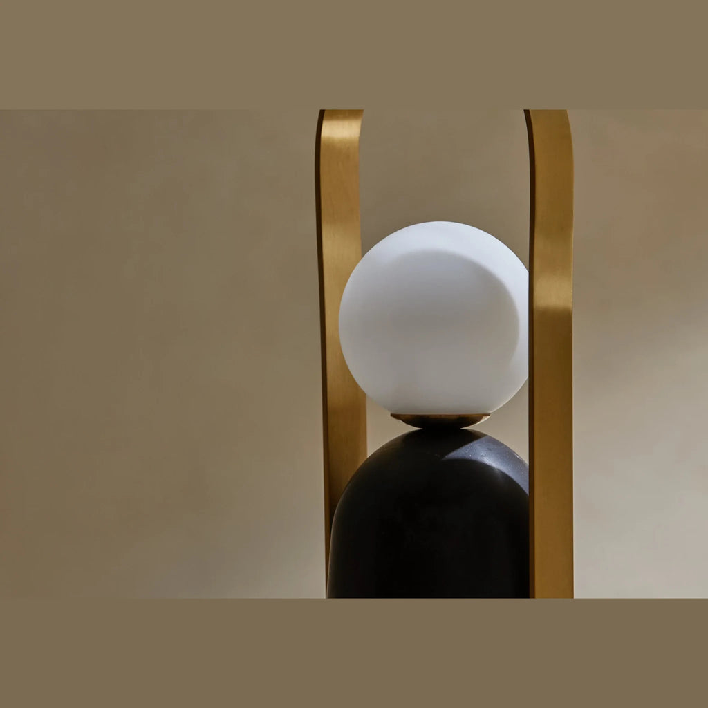 Cordless marble opal globe table lamp, close-up of the opal globe and handle