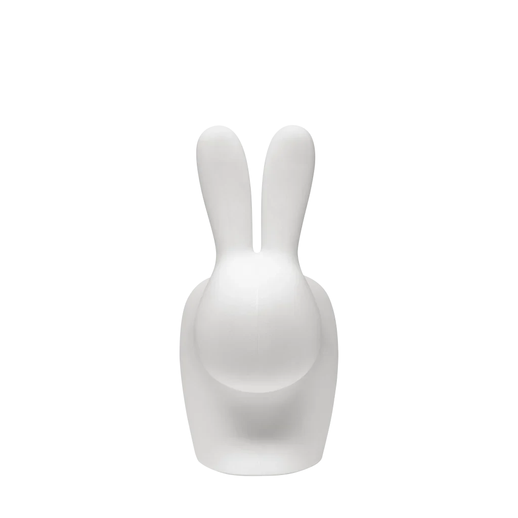 Cordless rabbit-shaped table lamp and seat, translucent, front view, lit