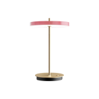 Cordless rechargeable LED table lamp, brass base, in rose, front view