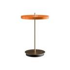Cordless rechargeable LED table lamp, brass base, in orange