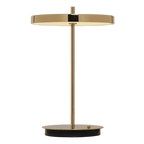 Cordless rechargeable LED table lamp, brass base, close-up of the disc and brass stem