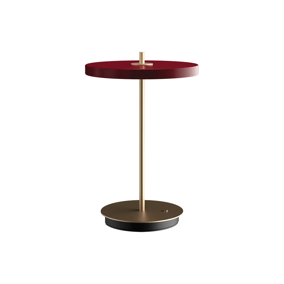 Cordless rechargeable LED table lamp, brass base, in ruby red