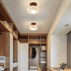 Cream glass flush ceiling light, two fitted along a dressing room