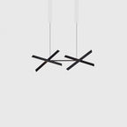 Crossed bar linear LED pendant, in black, bars angled