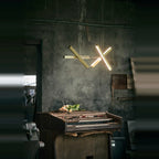 Crossed bar linear LED pendant, in champagne gold, lit