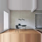 Crossed bar linear LED pendant, in an open room above a desk