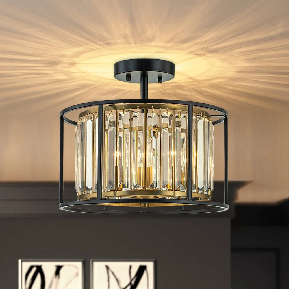 Crystal drum semi-flush ceiling light in black and brass, lit in a living room