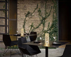 Crystal-effect cordless table lamp, on a restaurant table