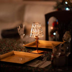 Crystal-effect rechargeable table lamp, lit on a dinner table