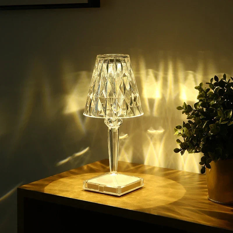 Crystal-effect rechargeable table lamp, lit on a wooden side table