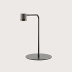 Curved-arm LED reading table lamp, in a grey metal finish, on a round base