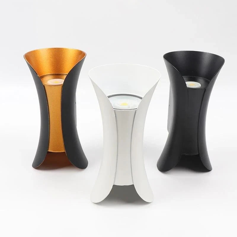 Curved up and down outdoor wall light, in three finishes