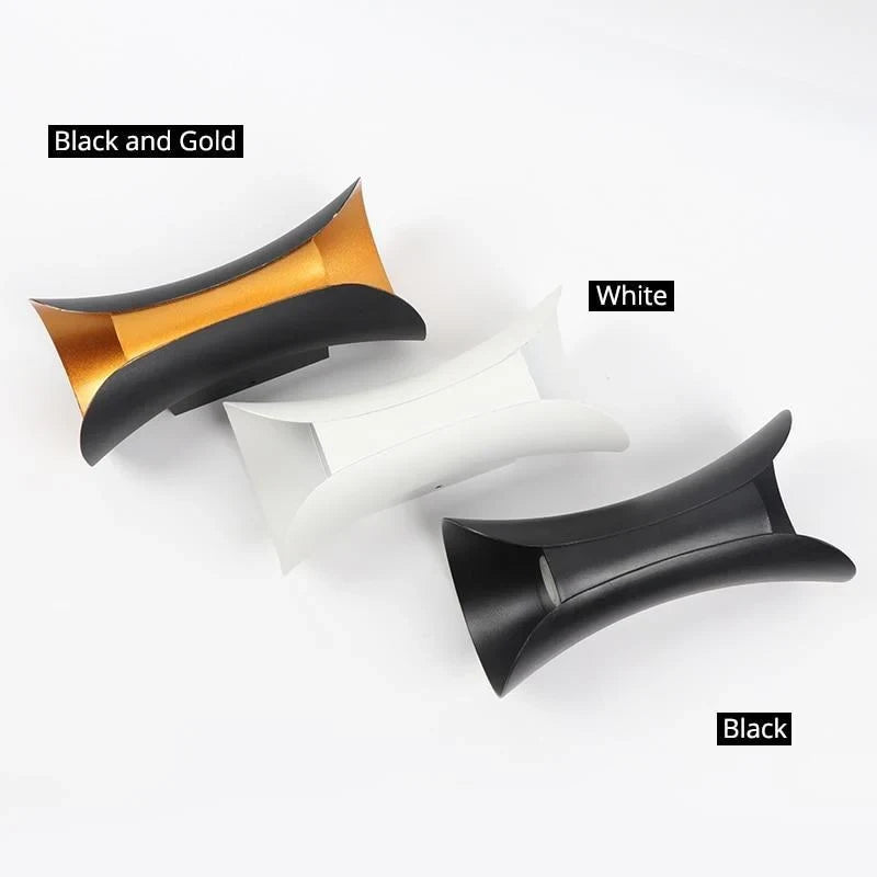 Curved up and down outdoor wall light, in three finishes
