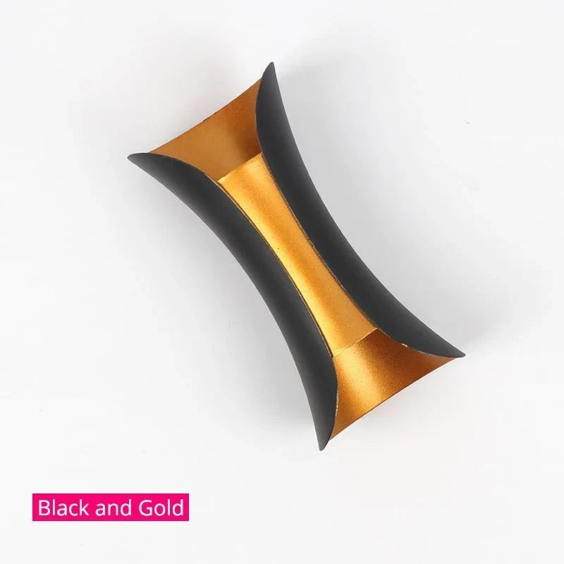 Curved up and down outdoor wall light, in black and gold
