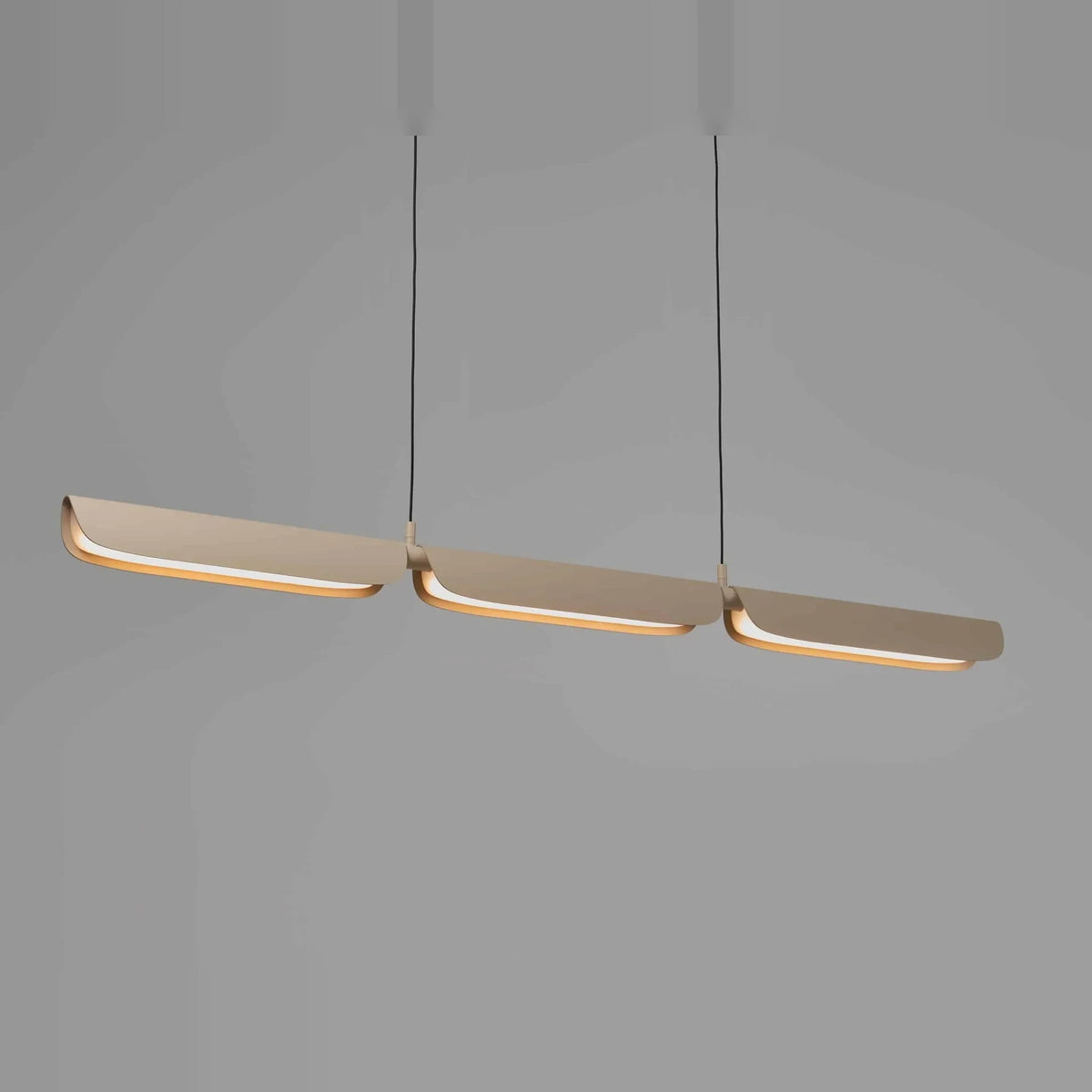 Curved shade linear LED pendant, in oatmeal, lit