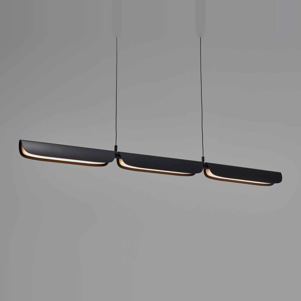 Curved shade linear LED pendant, in black, lit