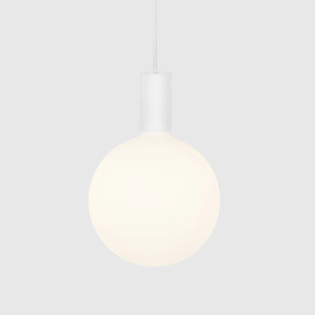 Cylinder pendant with matt white globe bulb, chalk, bulb at a warm dimmed setting, alternative view