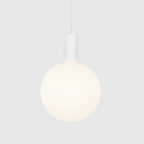 Cylinder pendant with matt white globe bulb, chalk, bulb at a warm dimmed setting, alternative view