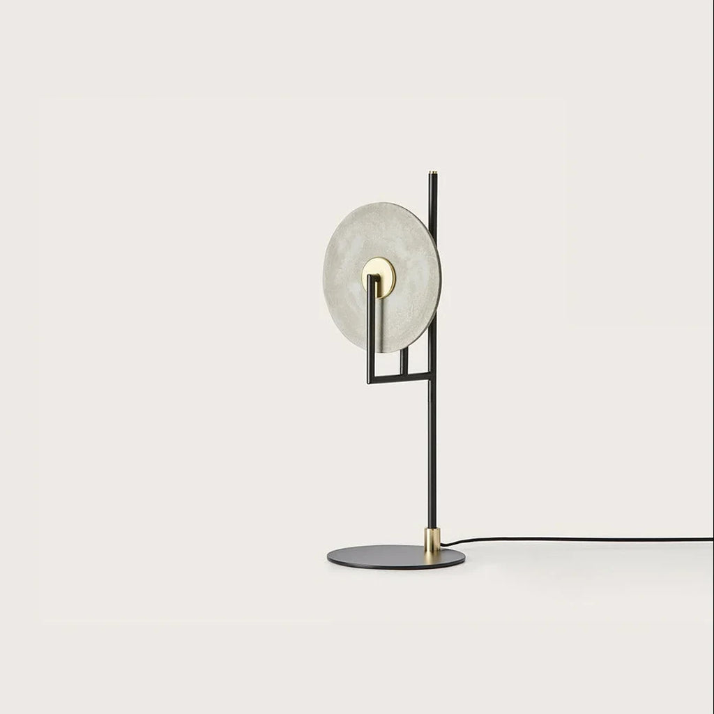 Open frame table lamp, with an alabaster disc, front view