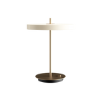 Disc-top LED table lamp with brass stem, in pearl white