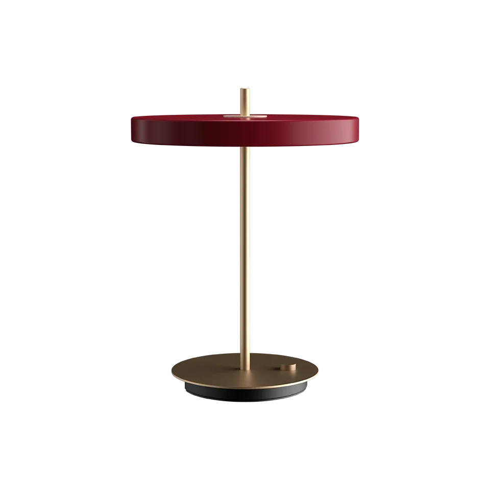Disc-top LED table lamp with brass stem, in ruby red