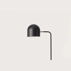 Dome shade reading floor lamp with white marble base, close-up of the dome shade