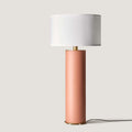 Extra-tall hand-painted ceramic cylinder table lamp, in a pink terracotta colour, shown with a drum shade (sold separately)