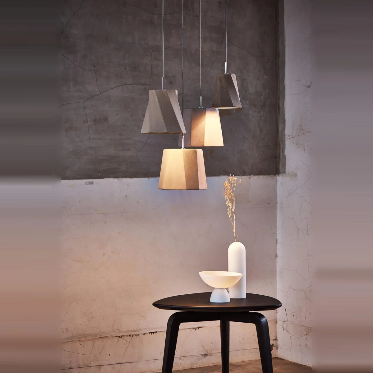 Faceted concrete pendant, cluster above a side table