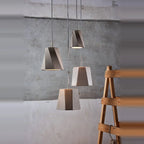 Faceted concrete pendant, cluster beside a ladder