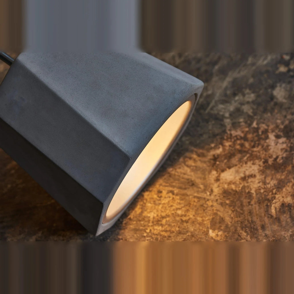 Faceted concrete pendant, close-up of the faceted concrete