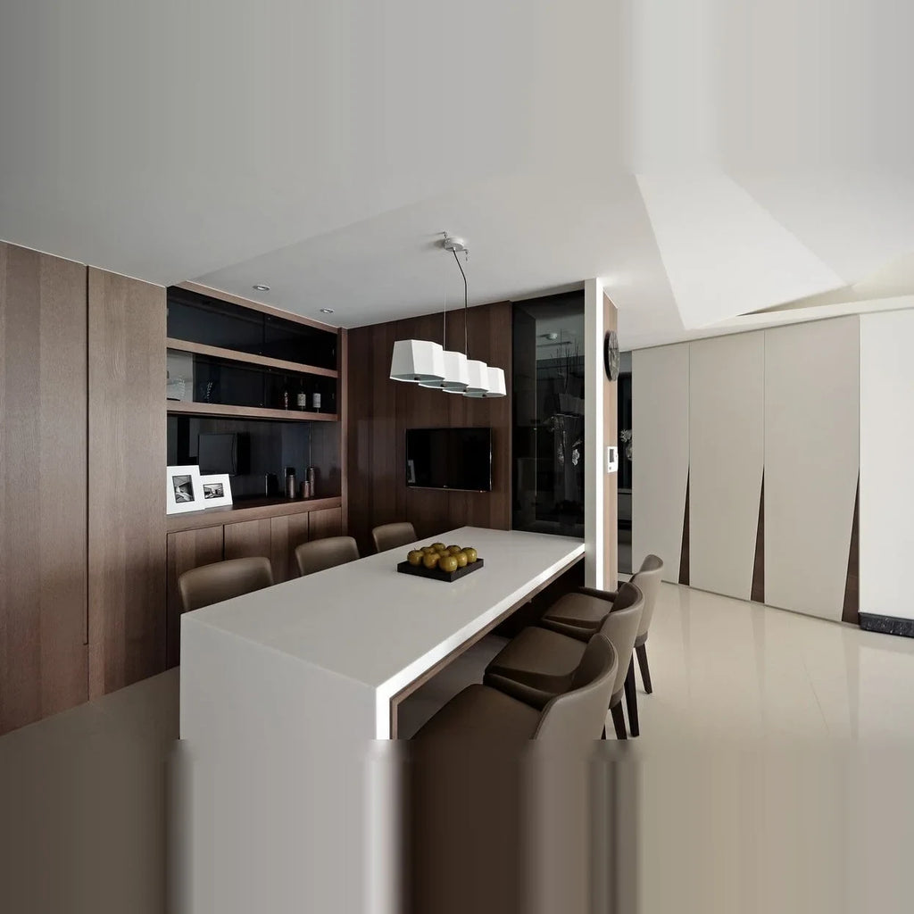Faceted metal linear pendant, above a kitchen island