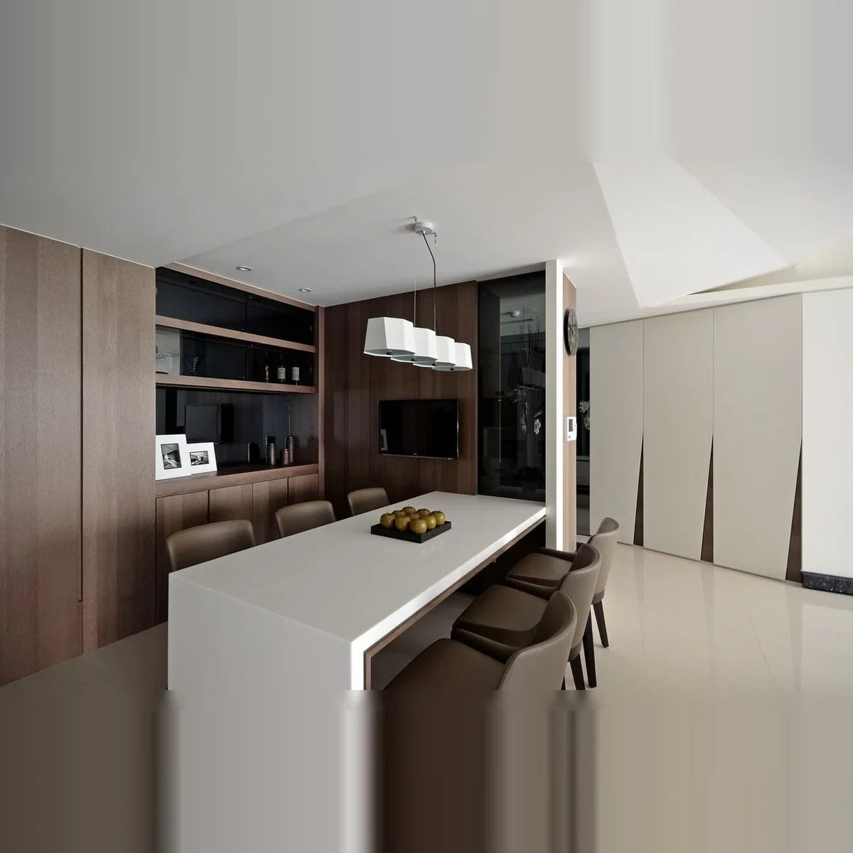 Faceted metal linear pendant, above a kitchen island