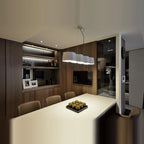 Faceted metal linear pendant, in white above a kitchen island