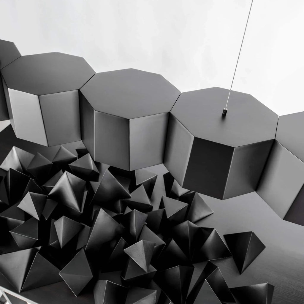 Faceted metal linear pendant, close-up of the faceted shades