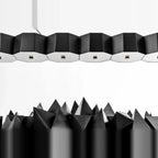 Faceted metal linear pendant, close-up of the black shades