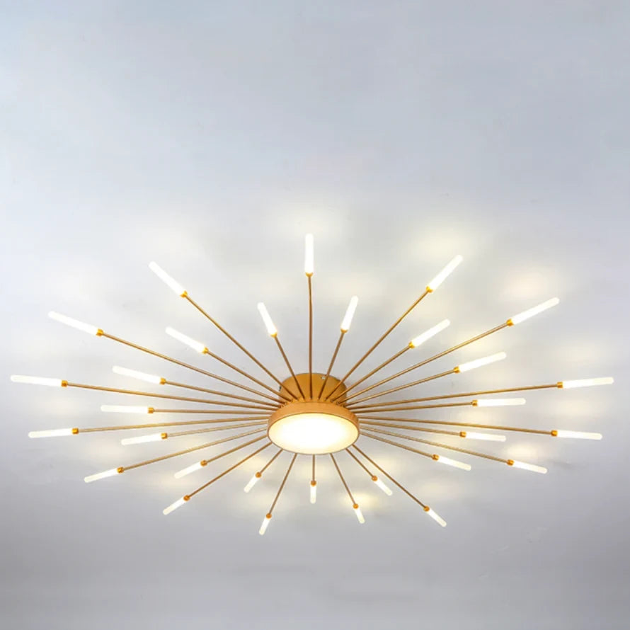 Firework LED ceiling light, in gold, lit on a ceiling