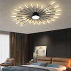 Firework LED ceiling light, in black, lit in a bedroom