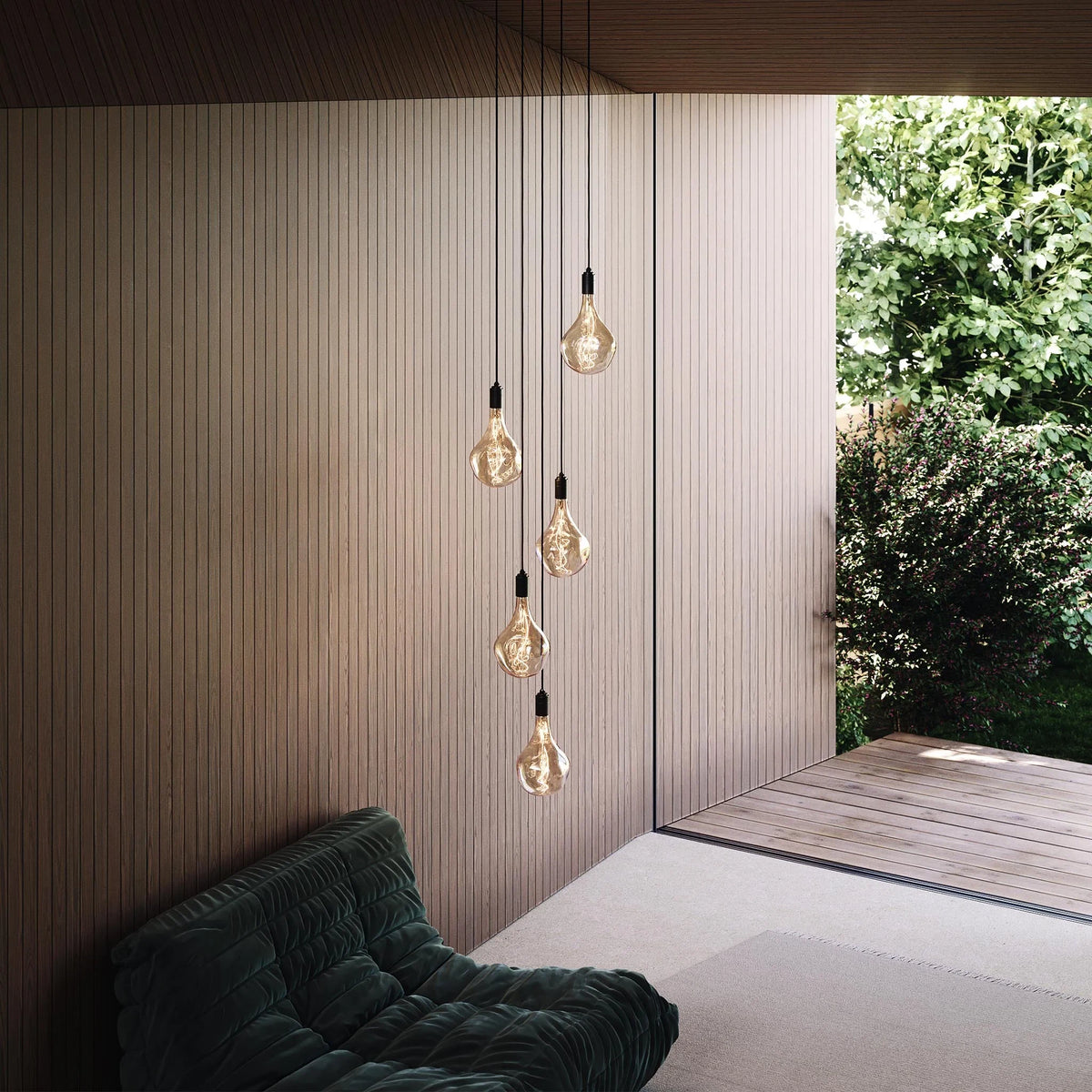 Five-drop cluster pendant, graphite, with decorative bulbs (not included) by a garden window