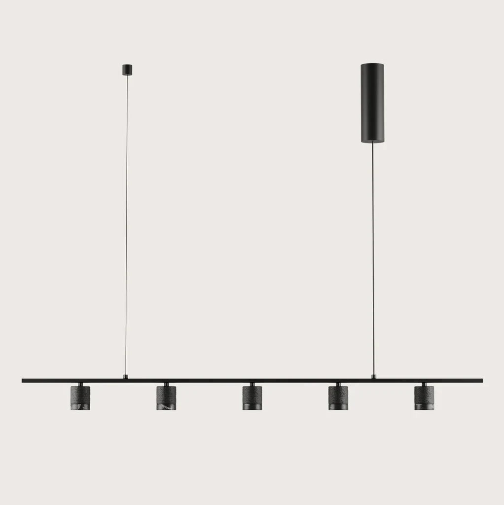 Five-light marble spot linear pendant, in matte black on a plain background