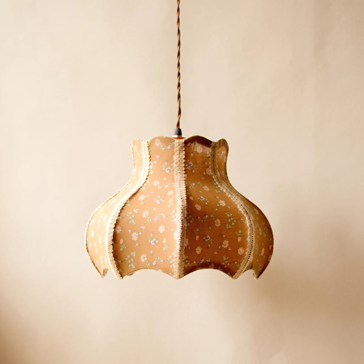 Floral linen pendant light with scalloped shade