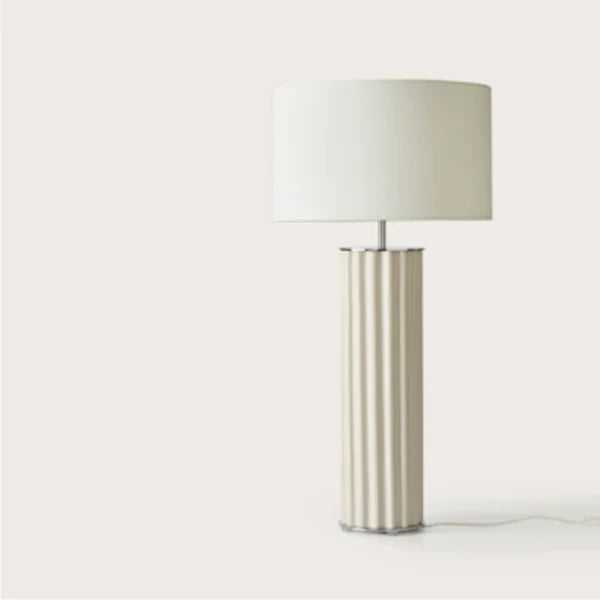 Fluted ceramic column table lamp, in cream, front view, with a shade (not included)