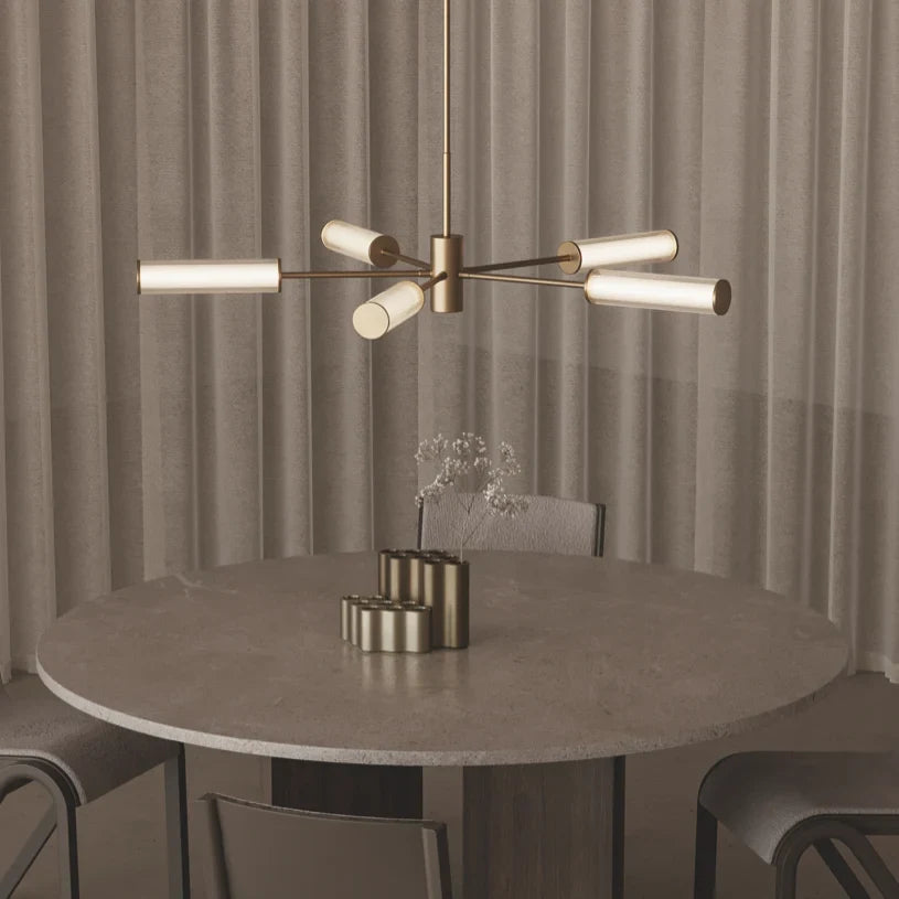 Fluted glass tube LED chandelier, above a round dining table