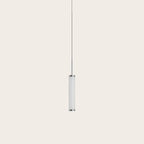 Fluted glass tube LED pendant, on a plain background