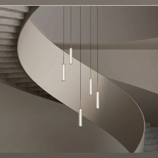 Fluted glass tube pendant, set of five in a stairwell